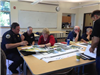 Employees Reviewing a Map
