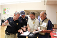 Hazmat Exercise Saturday - August 2012 - Men Reviewing Important Documents