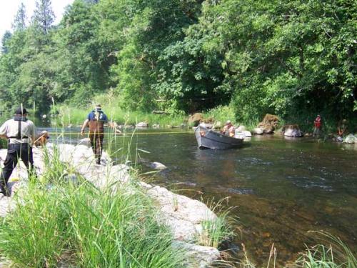 Boat Crossing a River