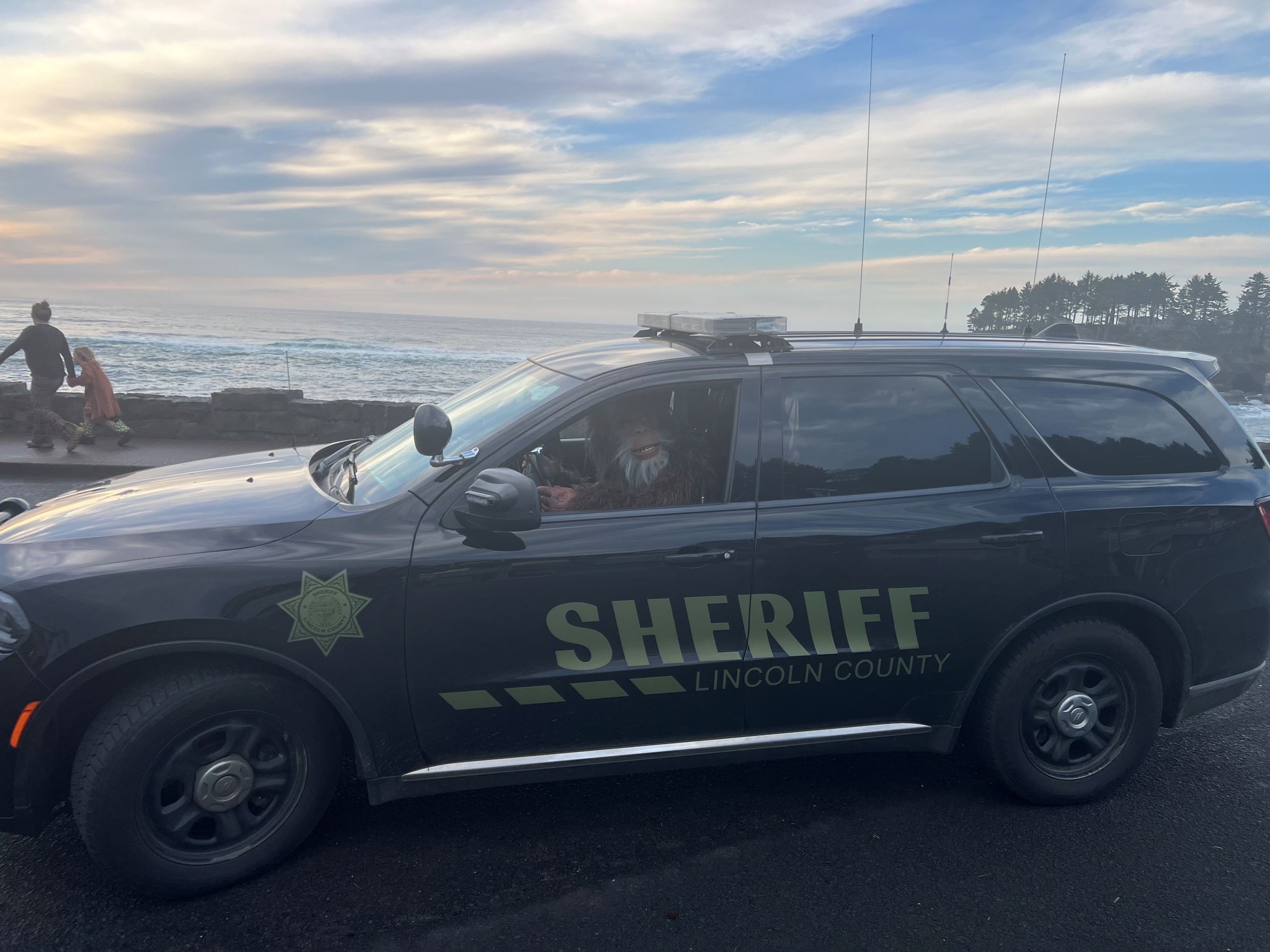 Big Foot in Patrol Car